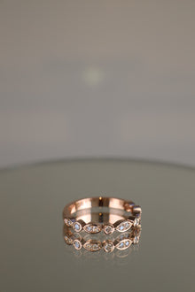 Rose gold art deco round brilliant diamond ring